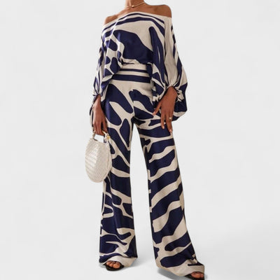 Rivana – Satijnen Co-Ord Set met Asymmetrische Top en Artistieke Print